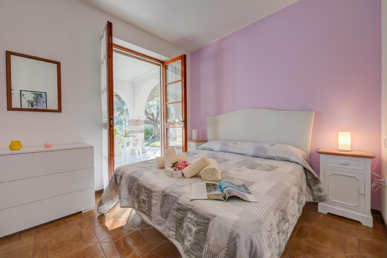 Villa Fiorita Apartments - Happy Rentals Сирмионе Экстерьер фото